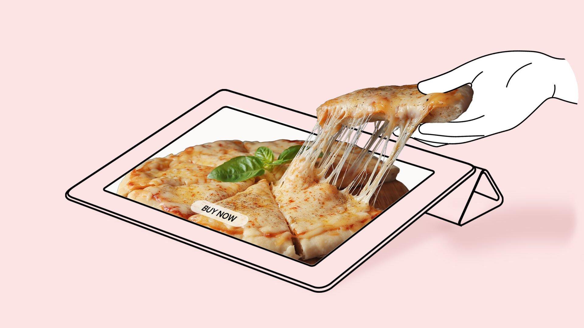 A hand picks up a slice of cheese pizza from a tablet that reads buy now