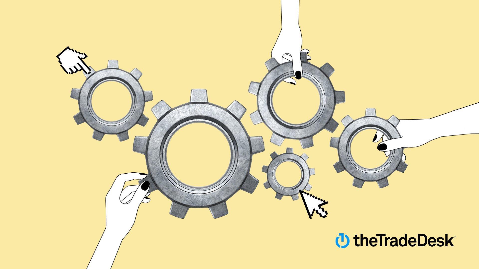 Illustration shows several gears being held by hands or tapped by cursors