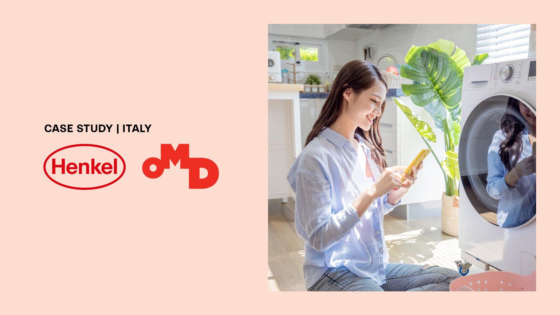 Image shows Henkel and OMD logo while a woman sits with her phone in front of a washing machine